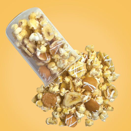 banana pudding gourmet popcorn from The Cupcake Lab in Atlanta, GA – vanilla banana popcorn with Nilla wafer crumble and creamy drizzle

The Cupcake Lab ATL, The Cupcake Lab, sweet treats, popcorn Atlanta, gourmet popcorn Atlanta, gourmet popcorn, dessert popcorn, Atlanta snacks
