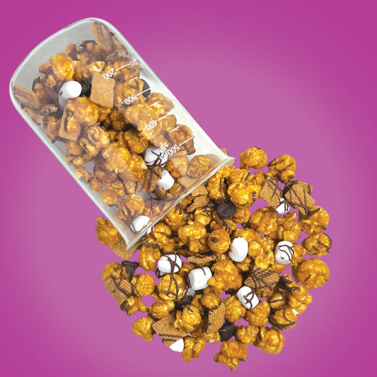 s’mores gourmet popcorn from The Cupcake Lab in Atlanta, GA – marshmallow, chocolate, and graham cracker popcorn fusion for campfire snack lovers

The Cupcake Lab ATL, The Cupcake Lab, sweet treats, popcorn Atlanta, gourmet popcorn Atlanta, gourmet popcorn, dessert popcorn, Atlanta snacks,
