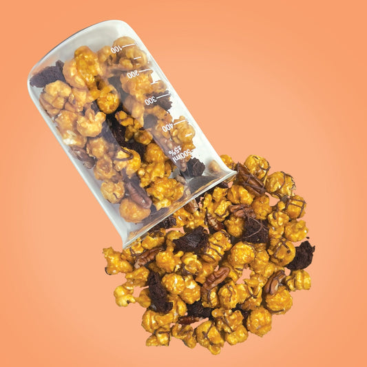 turtle brownie gourmet popcorn from The Cupcake Lab in Atlanta, GA – rich caramel, fudge, and pecans layered on chocolate popcorn

The Cupcake Lab ATL, The Cupcake Lab, sweet treats, popcorn Atlanta, gourmet popcorn Atlanta, gourmet popcorn, dessert popcorn, Atlanta snacks
